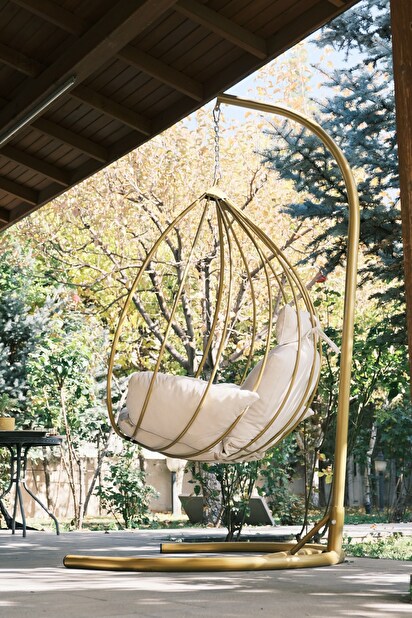 Zahradní houpací židle Druket (zlatá + krémová)
